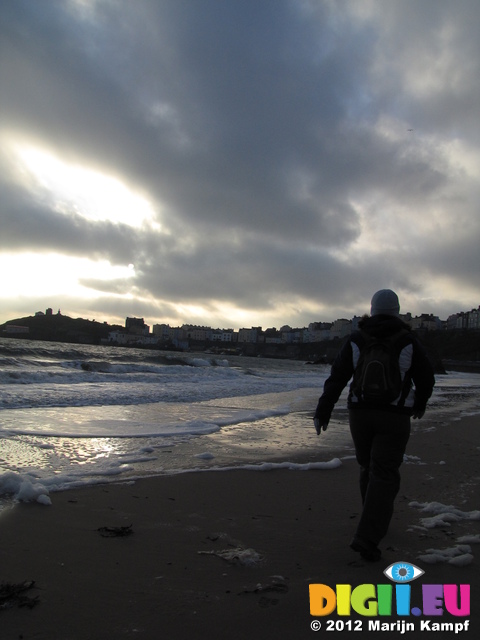 SX21394 Jenni walking on Tenby beach